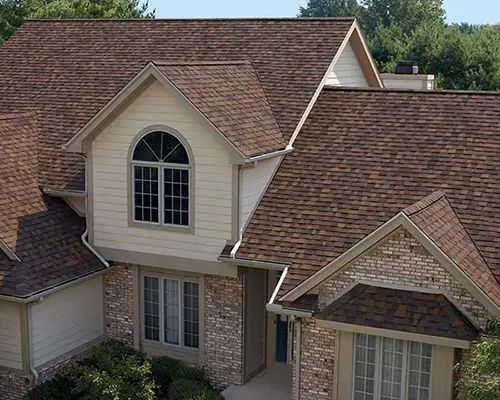Home with red shingles on roof
